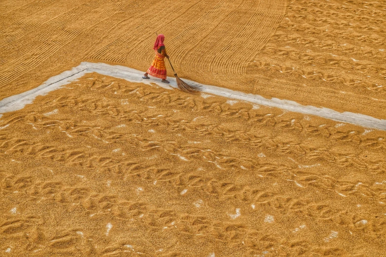 a woman standing in a large field