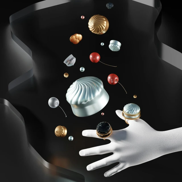 the hand is holding a small vase and a variety of pearls