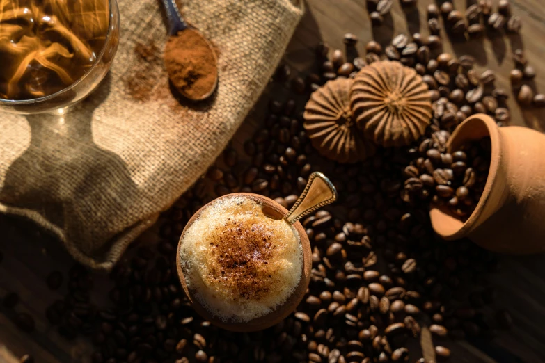 a couple cups of coffee sitting on top of a table