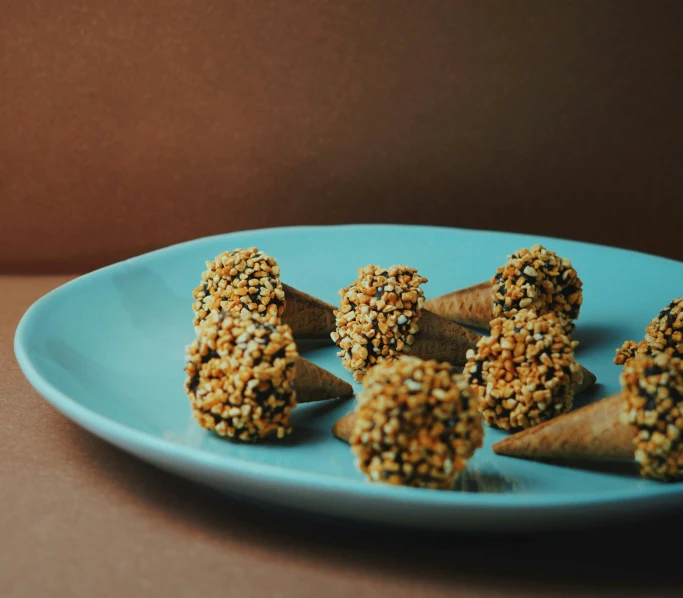 a plate with five mini treats sitting on it