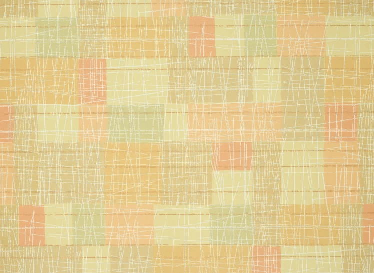 closeup on a background textured with yellow, orange, and pink squares