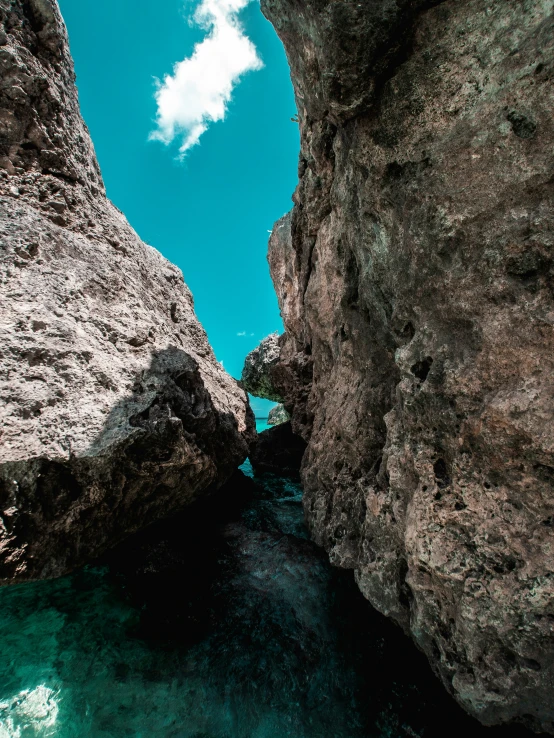 view from a boat through the rocks to the ocean