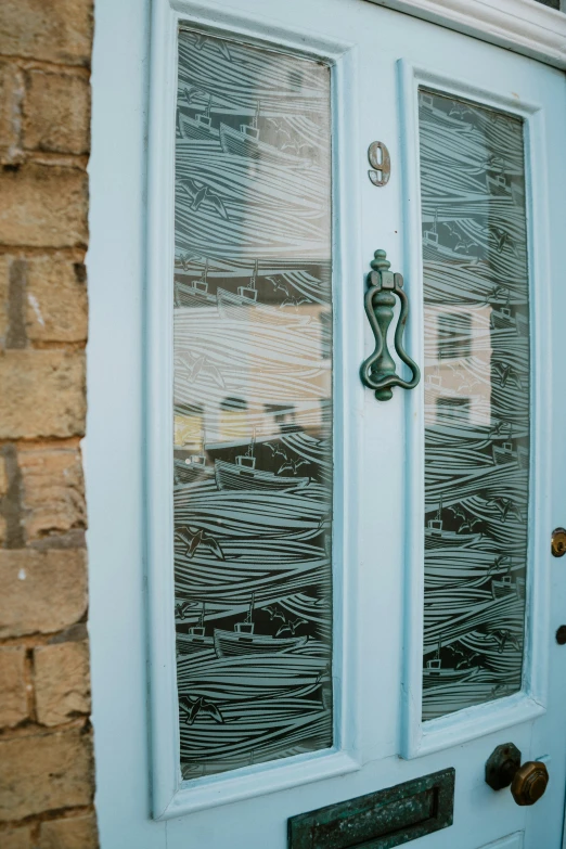 this door has a glass paneled design on it