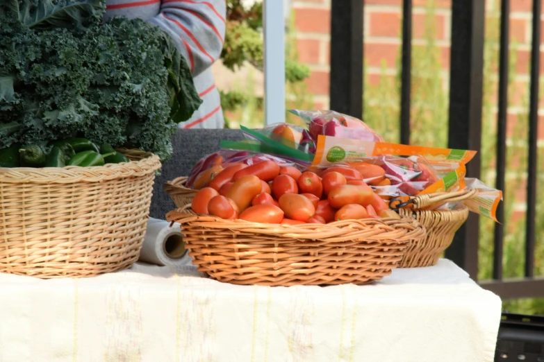 several baskets with vegetables and produce in them