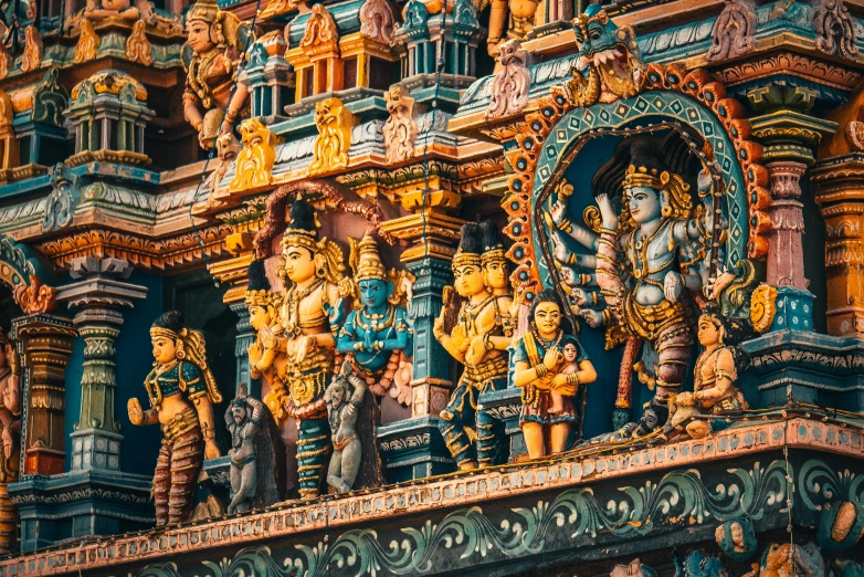 an ornate indian temple features intricate designs and sculptures