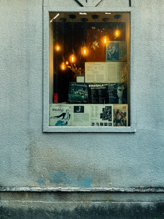 a building with a lit up window in it