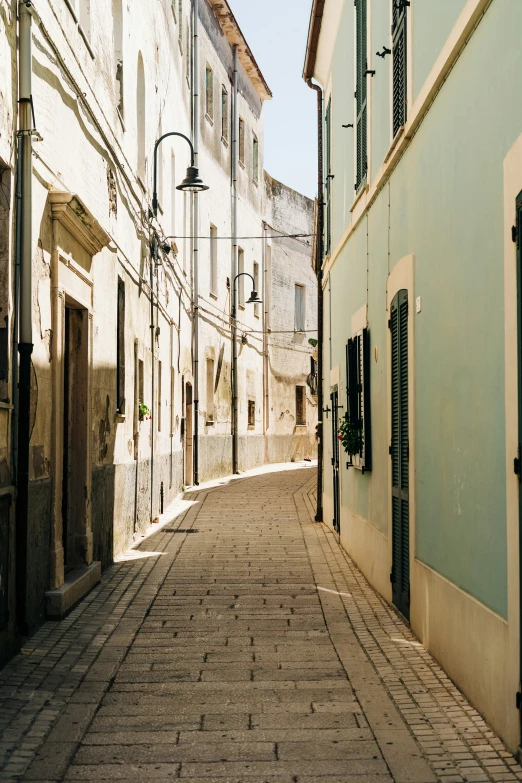 an empty street in the middle of a city