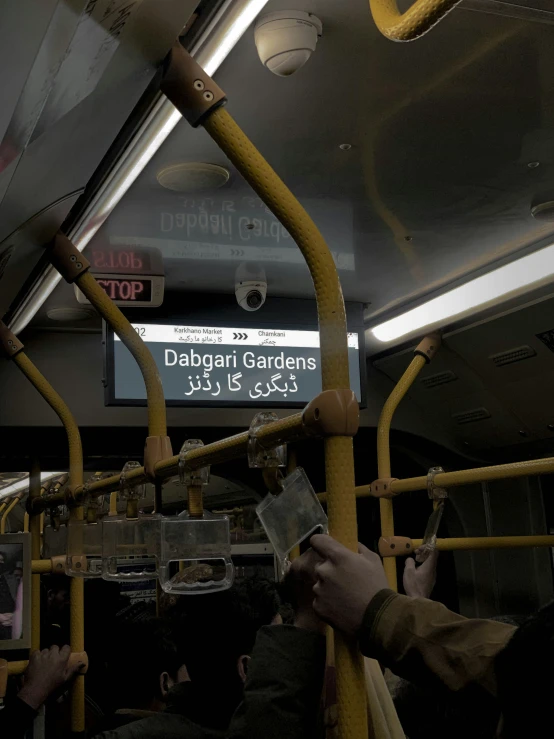 the man is holding a ticket on a public transportation bus