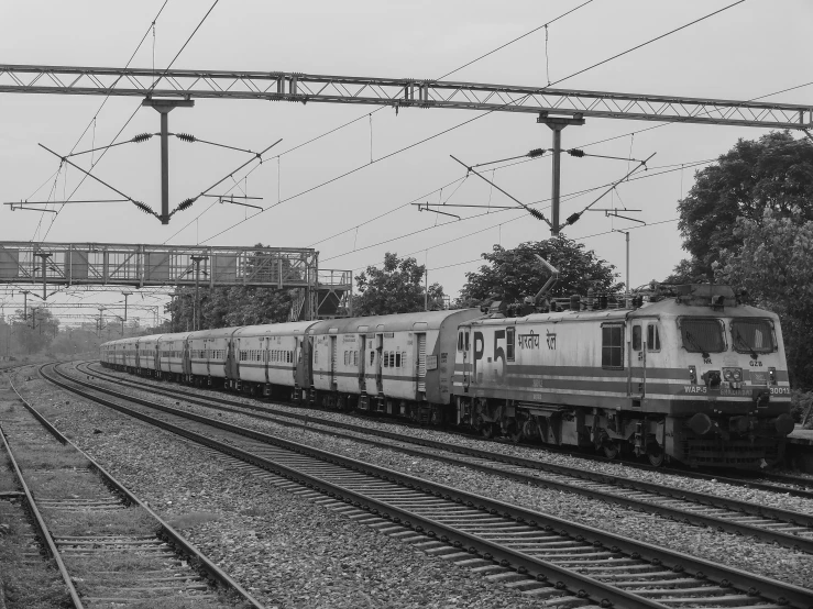 a train on a railroad track is coming down the tracks