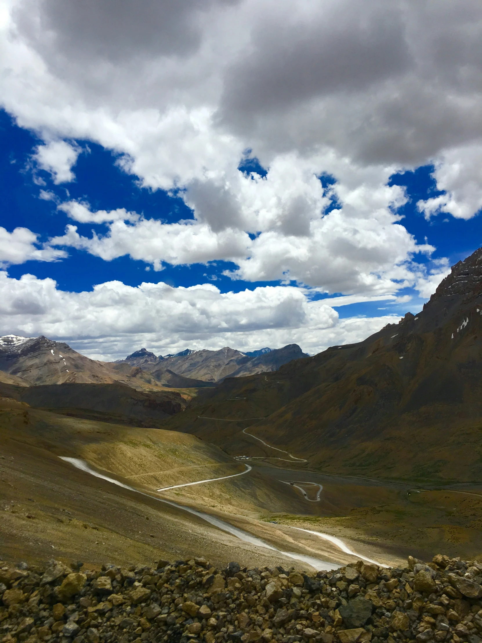 the mountains and the road are full of rocks