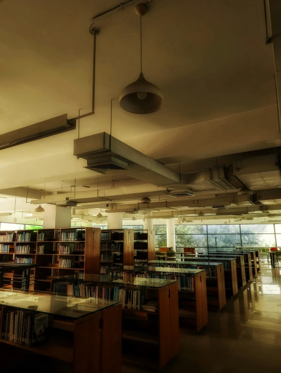 there are many shelves of books in the liry