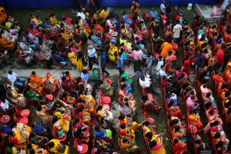 a crowded street filled with people and vendors