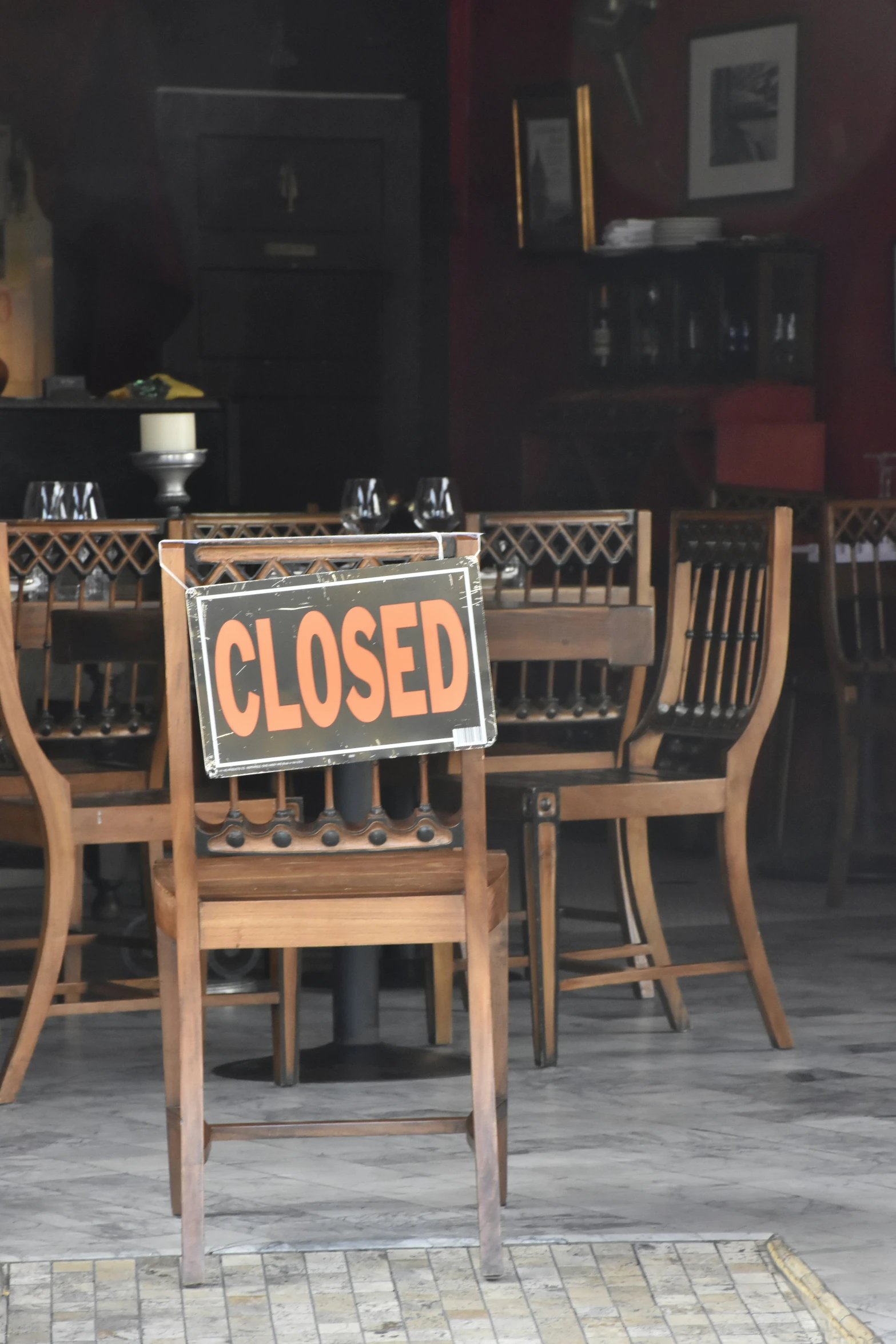 a closed sign sitting on top of a table