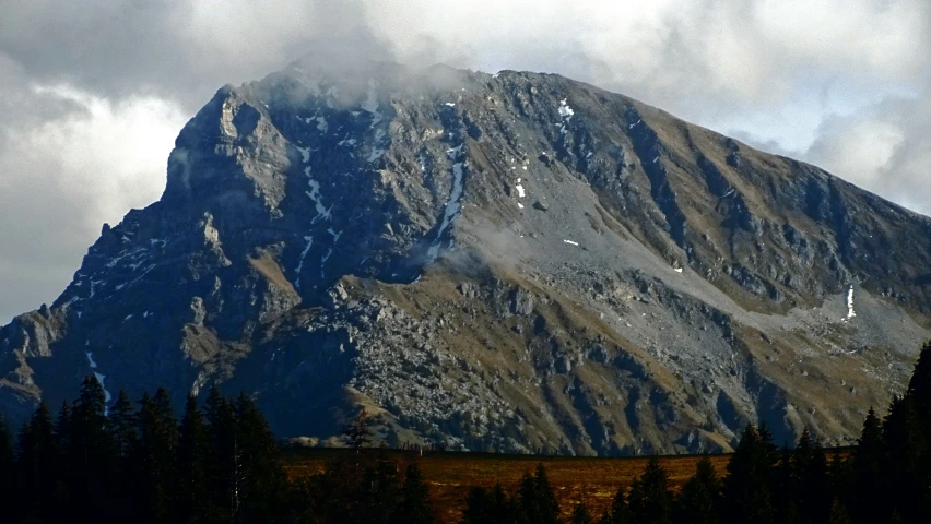 some very pretty mountains with a cloudy sky