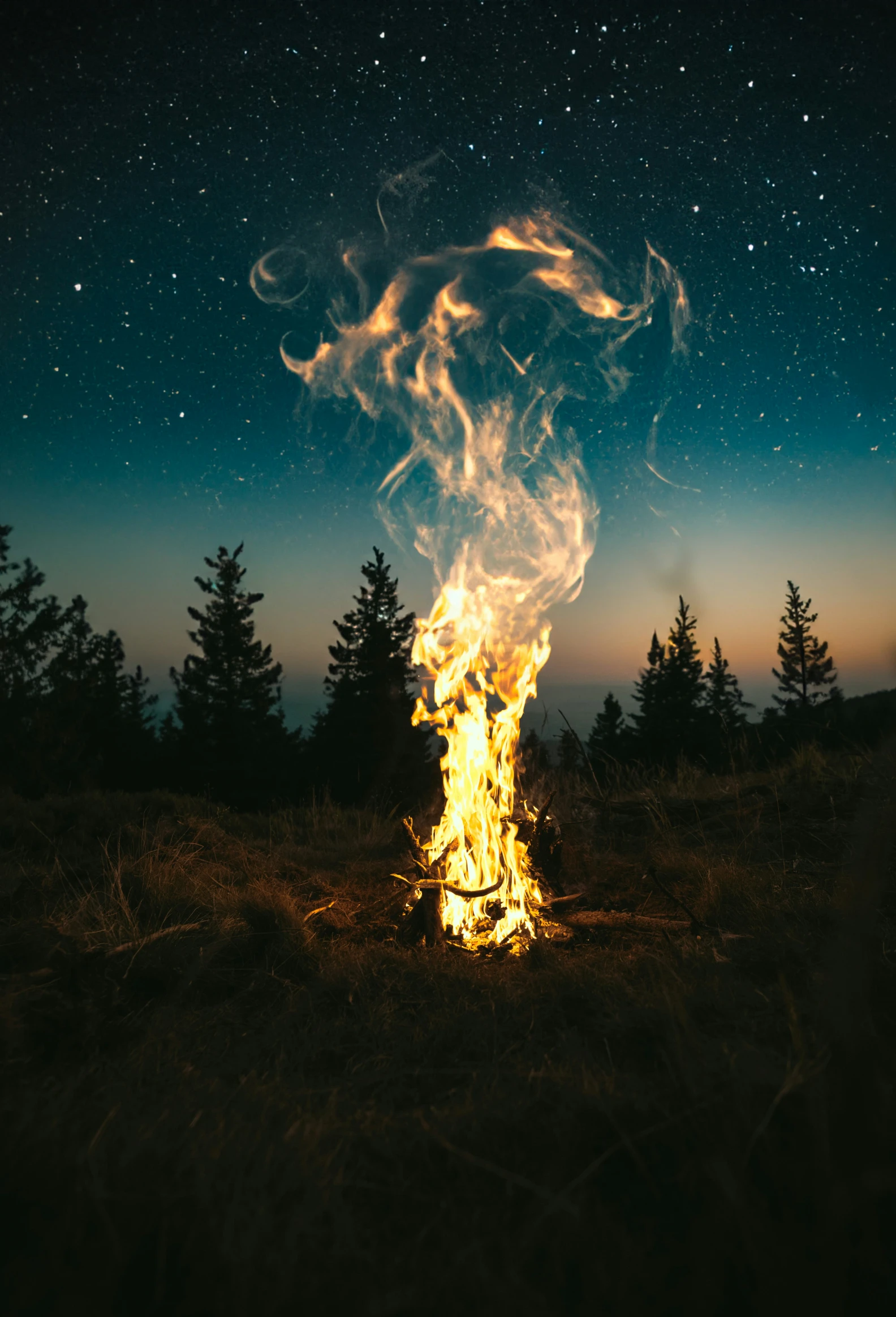 a burning bonfire with fire showing from the top