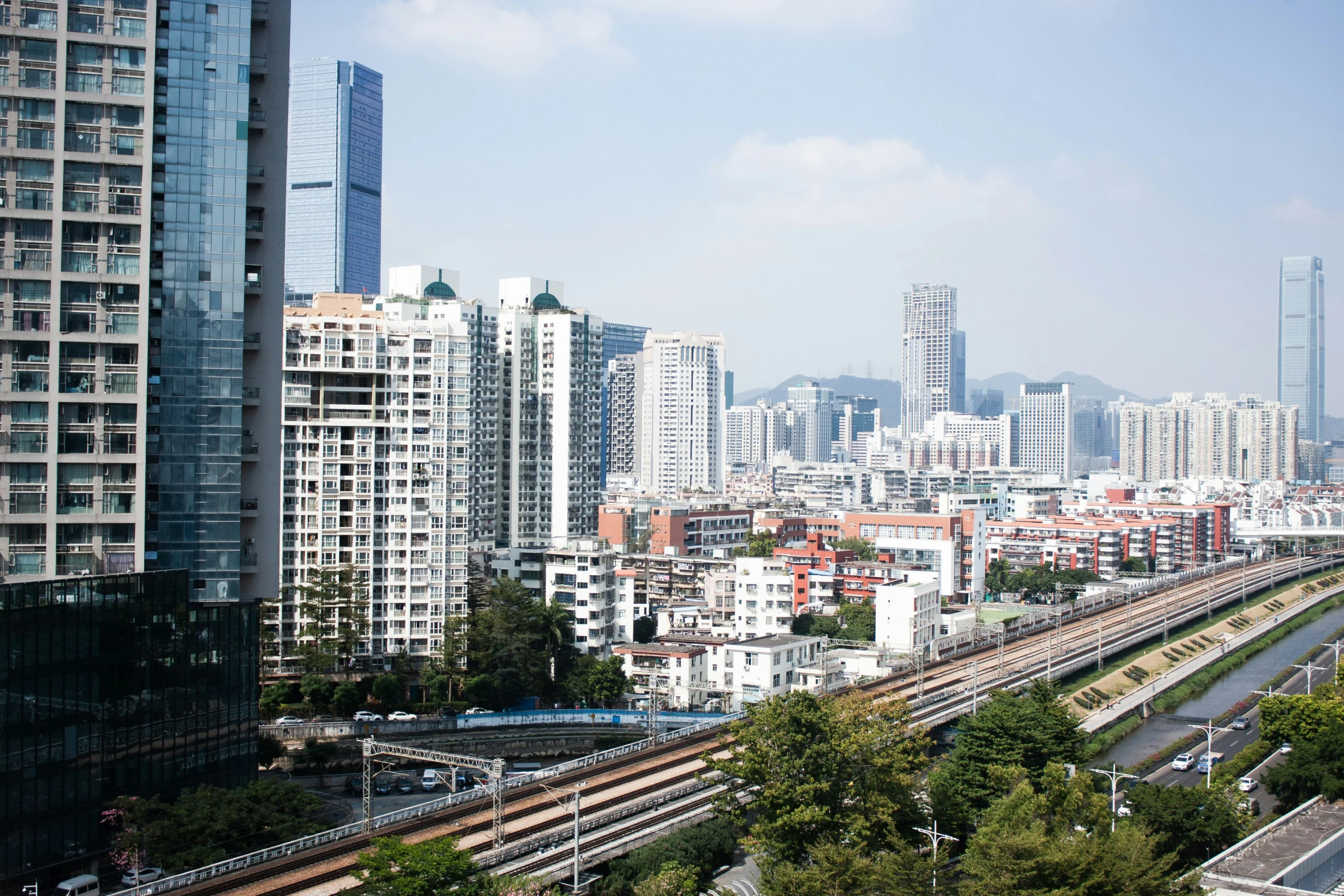 this is a city view with train tracks and a building