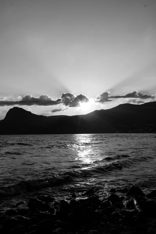 a black and white po of a person in the water