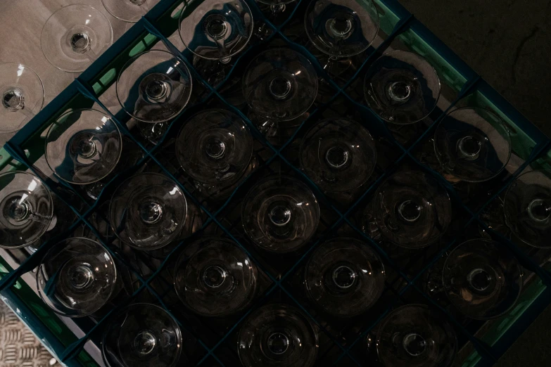 a number of wine glasses on a table