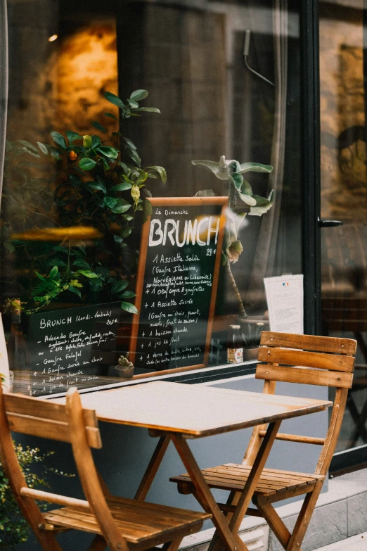 a wooden table in front of a window