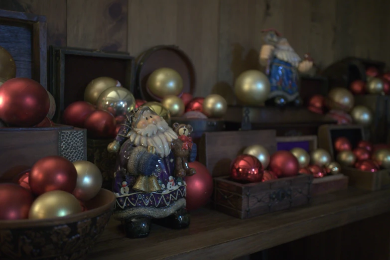 a christmas display on the shelf of a building