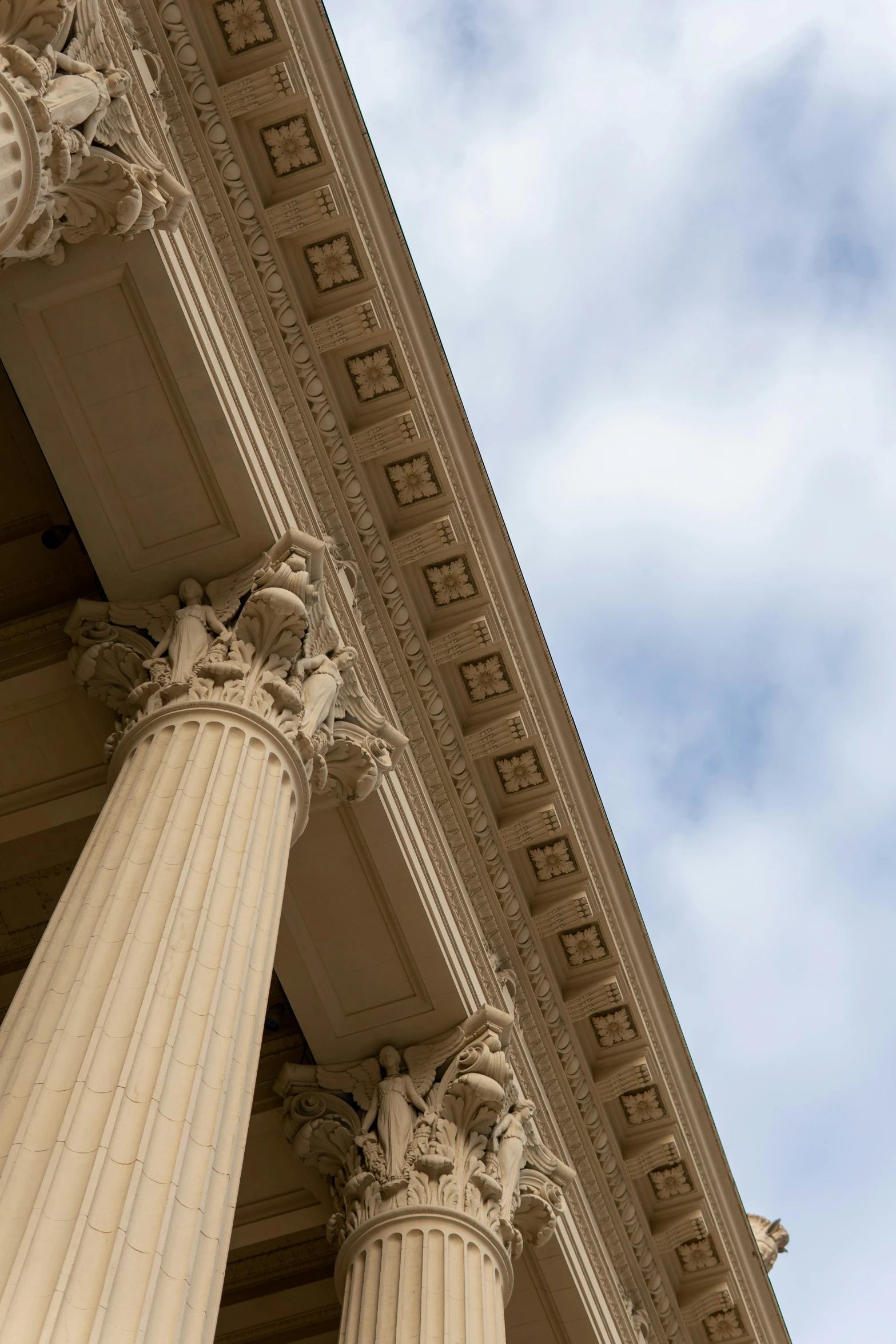 looking up at the front and side of the courthouse building