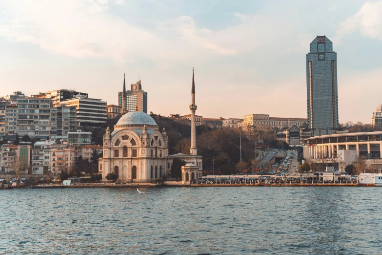 a big building on the bank of a lake