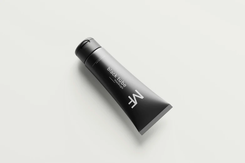 a tube of kerassen for men on a white surface