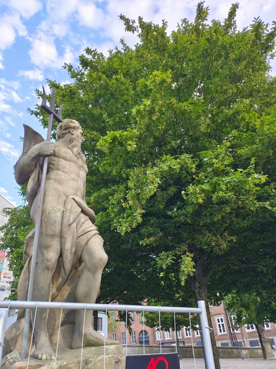 a large statue is standing on its hind legs