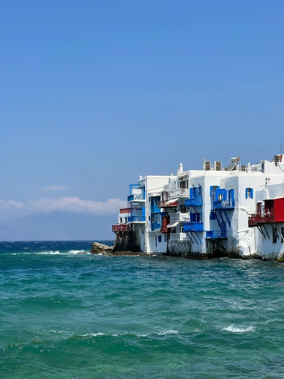 the water has blue and red windows next to it