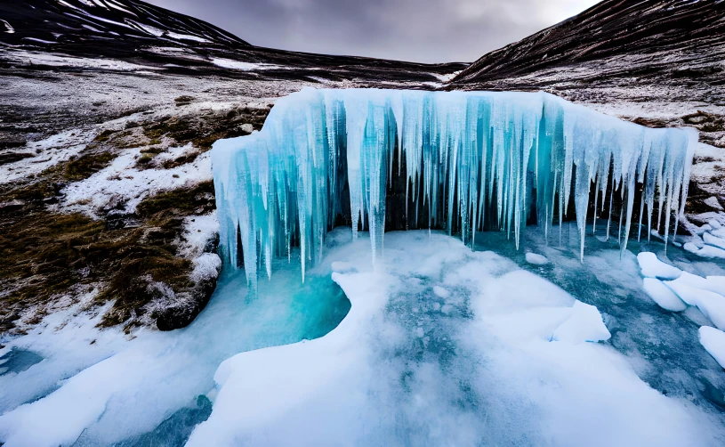 some very large frozen water with some snow