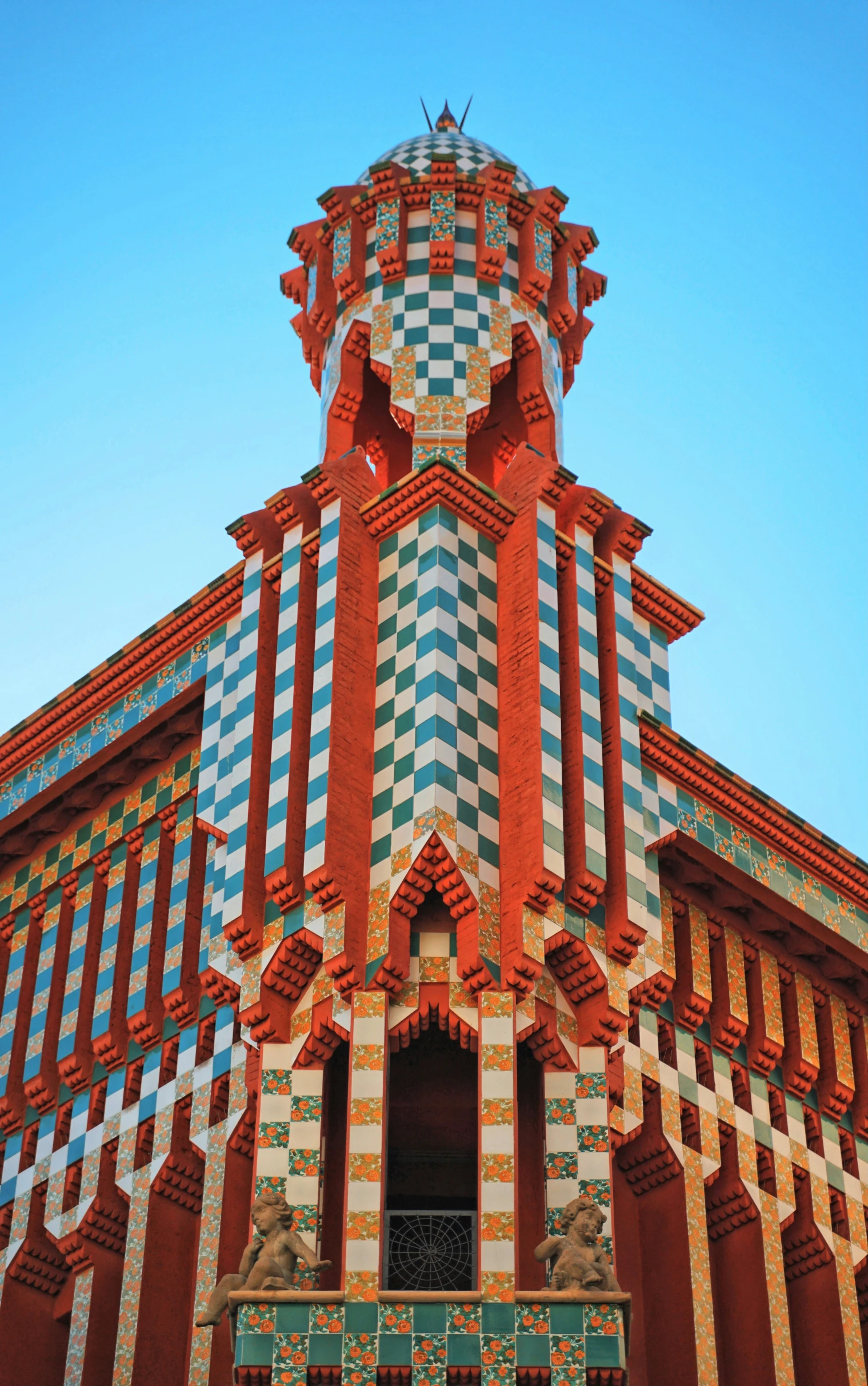 the building has several different colors and patterns on it