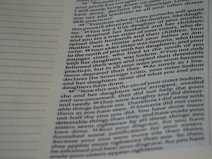 a close up of a book with an interesting page