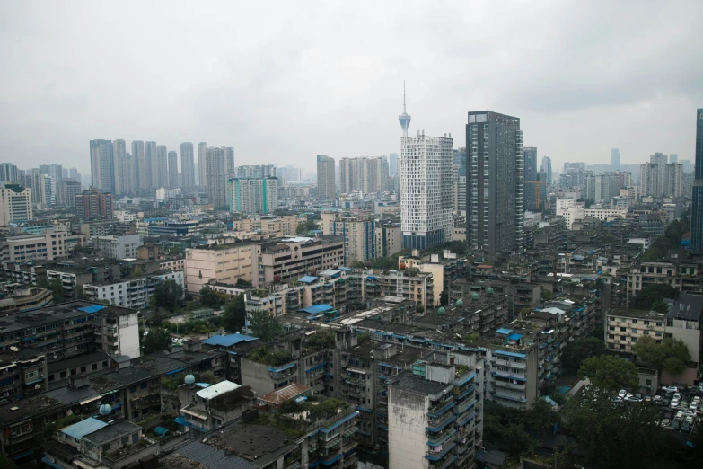 a picture of a city with buildings and tall skyscrs