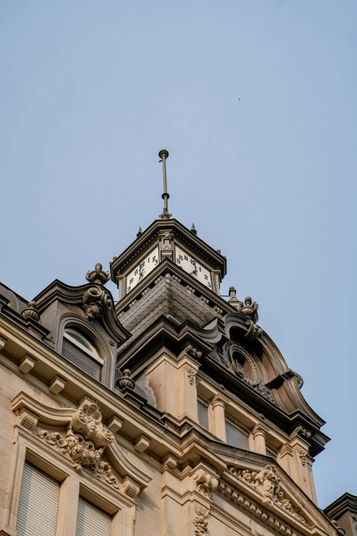 clock tower and sky from ground level looking up