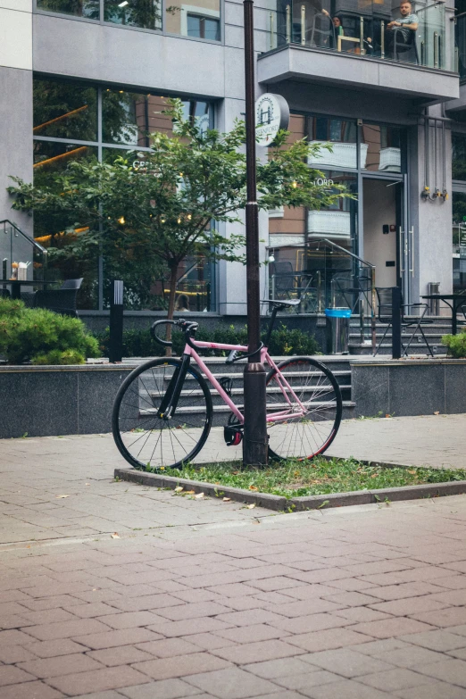 a bike is parked on the side of the street