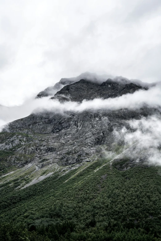 some sort of rocky mountain rising high into the sky