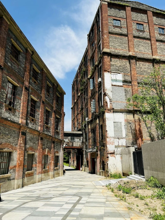 two old, run down buildings are side by side