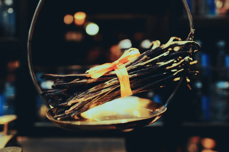 there are some sticks in a small bowl