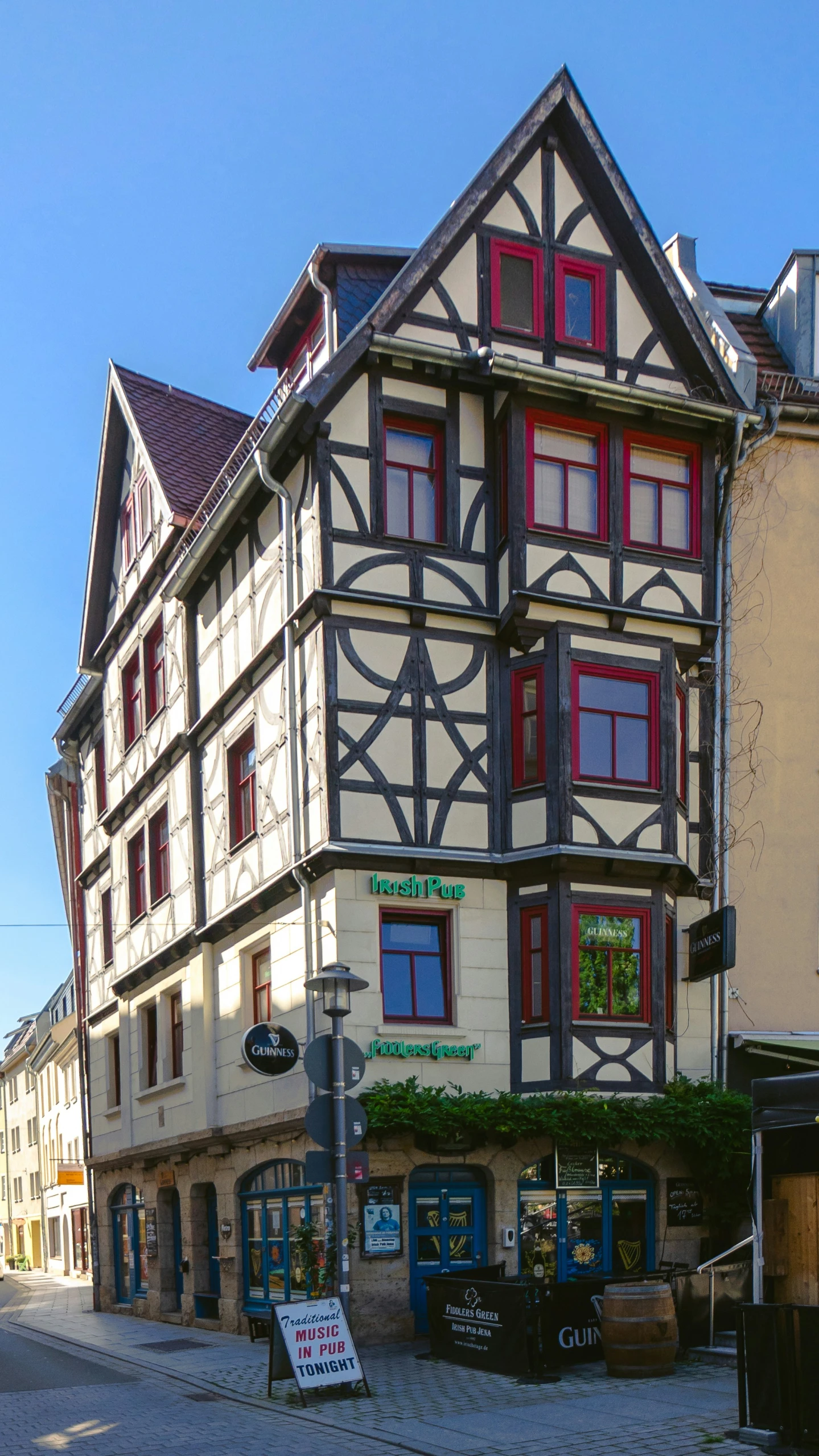 an old building in a european town on a street corner