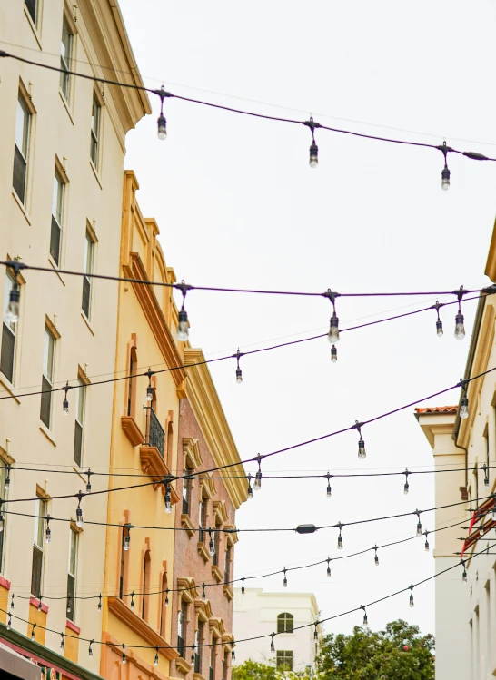 a number of power lines attached to buildings