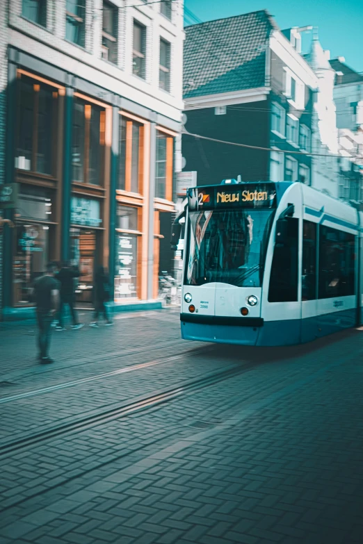an electric city trolley drives through the city