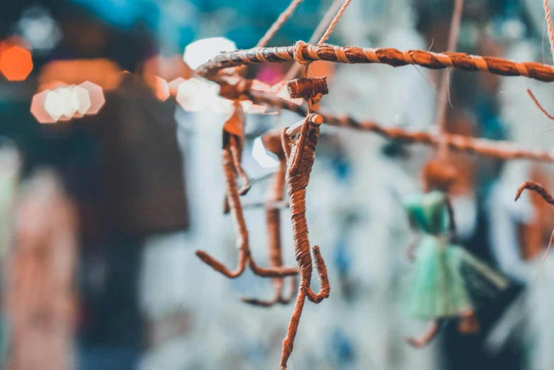 an arrangement of little items on a string