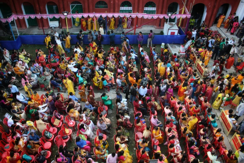 overhead view of a bunch of people dressed in various colors