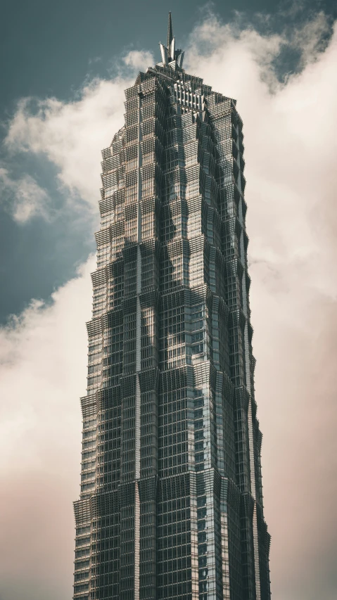 a tall building made out of multiple bottles