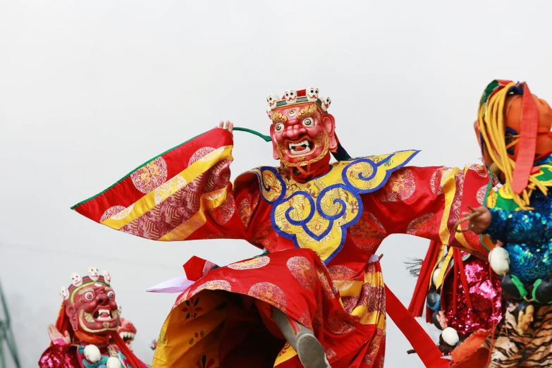 colorful painted costumes of people in asian style costumes