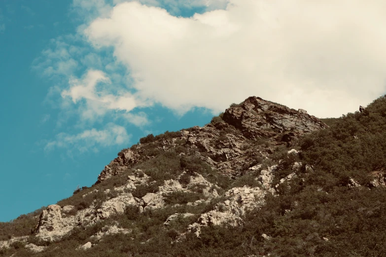 an image of the top of a mountain during the day