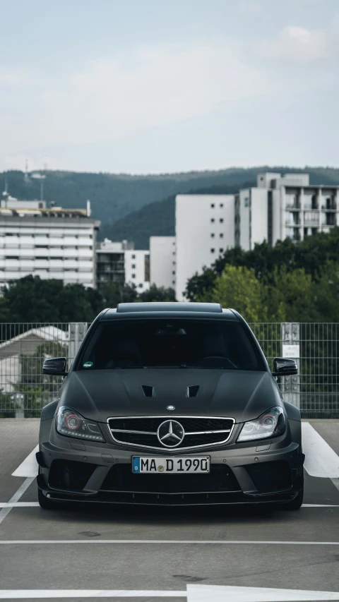 a mercedes benz car in a parking lot