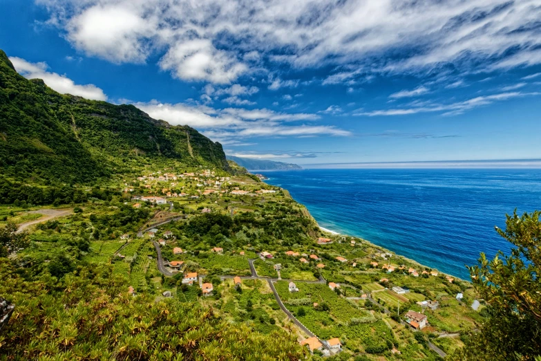 a scenic area overlooking the water and hills