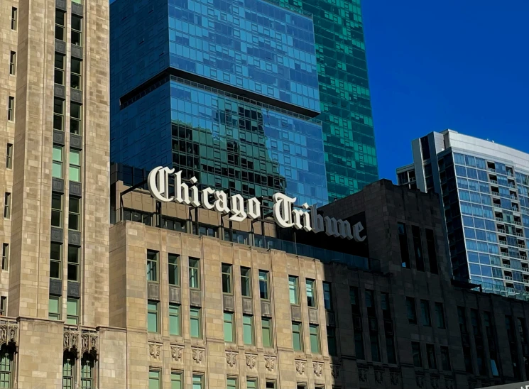 chicago tower in the backround of some buildings