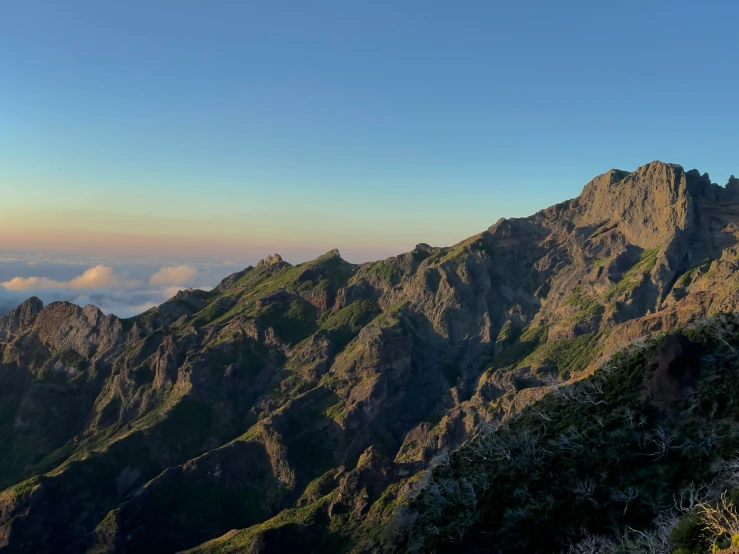 there is a view of mountains and clouds